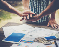 Business people making pile of hands. Teamwork concept. Business people making pile of hands. Teamwork concept.